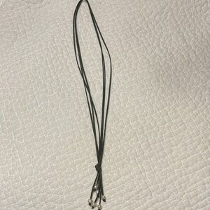 Leather strap (green) 22” long necklace with pearls.